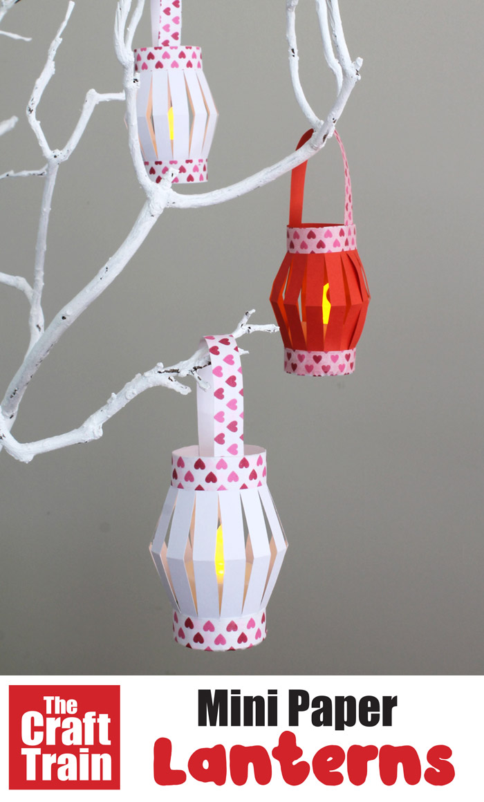 Paper lanterns hanging on tree