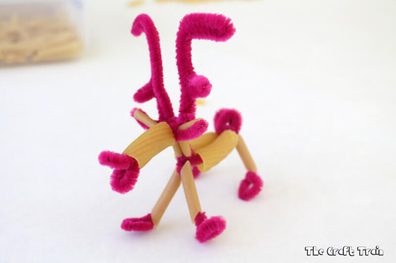 Create cute reindeer sculptures using pipe cleaners and pasta