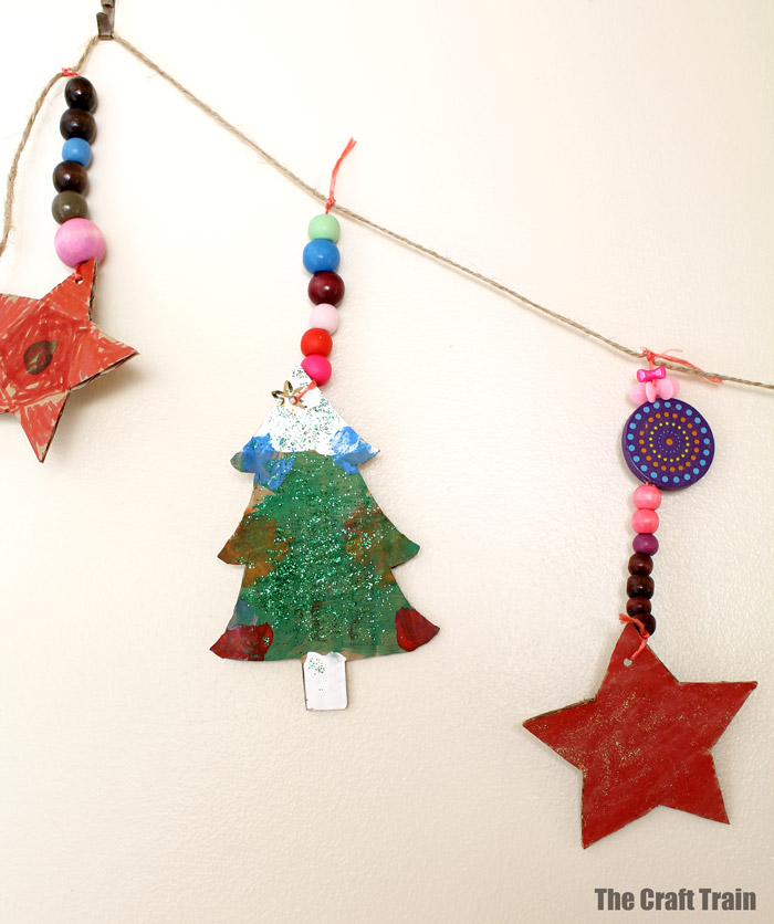 kid made ornaments on garland
