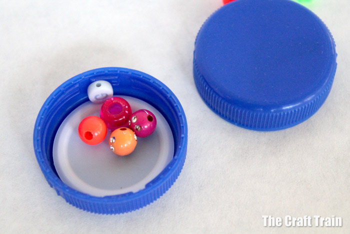 step one to make bottle cap shakers
