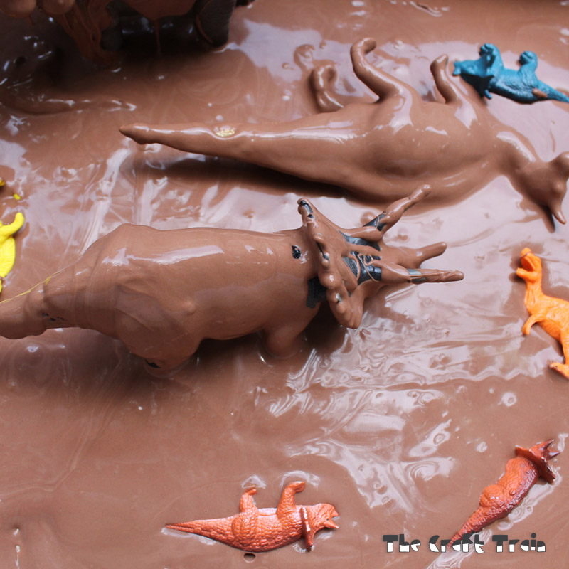 Dinosaurs in sticky mud