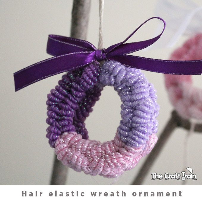 Hair elastic wreath ornament made using a loom band technique