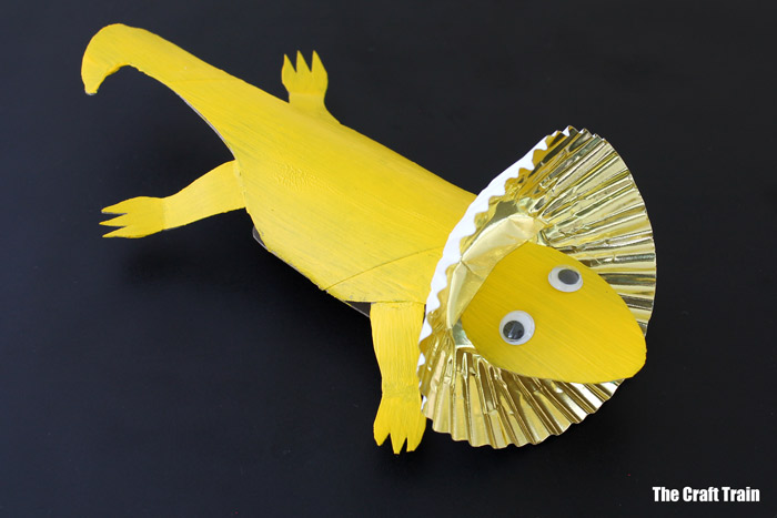 yellow frilled neck lizard craft made from a paper coll