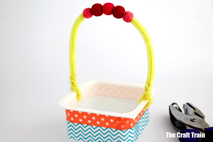 adding the handle to the Easter basket craft