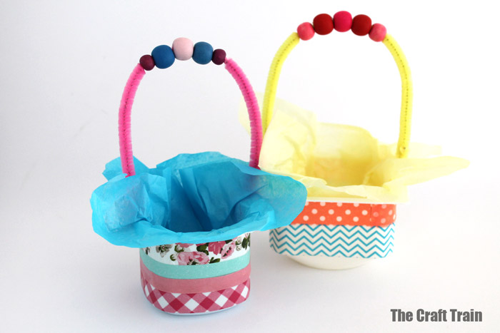 adding tissue paper to the Easter baskets
