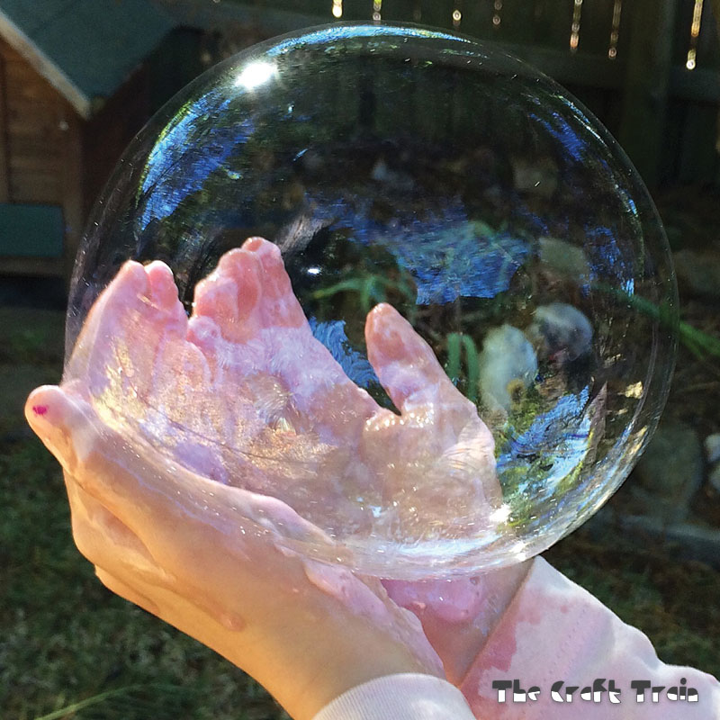 Soapy hand bubbles