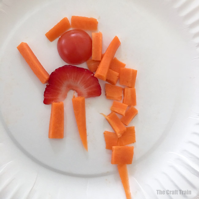 Healthy edible art activity for kids. This is a great way to encourage fussy eaters to touch and try new foods. Making art on their own plate is calming so picky eaters will be more open to trying new things. They end up with a fabulous and healthy artwork they can eat! #healthyeating #fussyeating #edibleart #kidsactivities #cookingwithkids #kidsfood