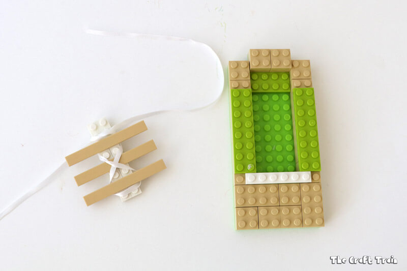 Create a Lego Soelace practice board to help kids learn to tie their laces