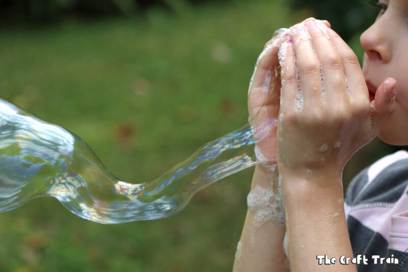 Create amazing bubbles with your hands using this simple 3-ingredient DIY bubble recipe