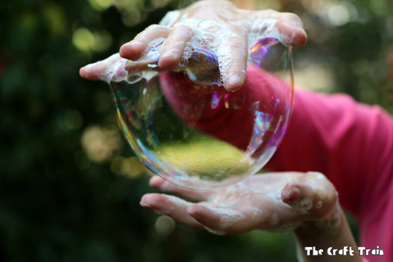 Create amazing bubbles with your hands using this simple 3-ingredient DIY bubble recipe