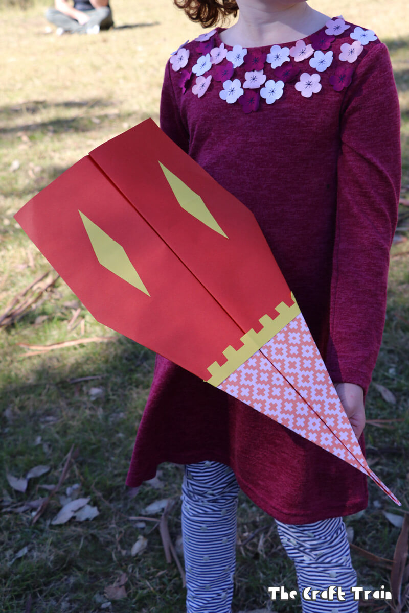 Scrapbook paper planes to fly outdoors