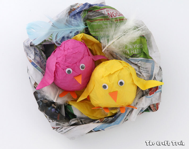 Paper chicks in a newspaper nest, an easy Spring craft idea for kids #spring #animalcrafts #chicks #newspapercrafts #Easter