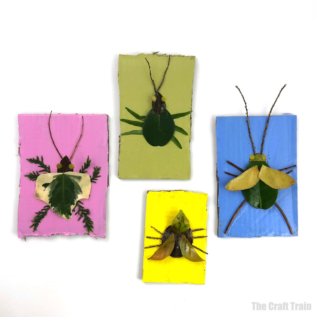 Easy nature art bugs. Make bugs from leaves and twigs. They really pop on bright painted backgrounds made from recycled cardboard, and make fun wall art #naturecraft #kidscrafts #bugs #insects #outdoors #cardboard #kidsactivities