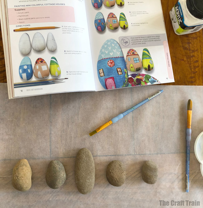 Gorgeous rock painting idea from the Rock Art Handbook by Samantha Sarles. Turn Rocks into miniature houses #rockpainting #Therockarthandbook #kidscrafts #rockpainting