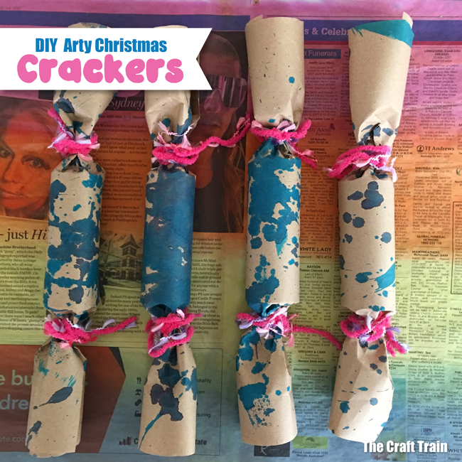Easy handmade DIY Christmas crackers idea. Decorate them with kid-made arty paper, and fill with kid-made surprises #christmascrackers #diycrackers #handmadechristmas #creativefun
