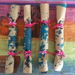 Easy handmade DIY Christmas crackers idea. Decorate them with kid-made arty paper, and fill with kid-made surprises #christmascrackers #diycrackers #handmadechristmas #creativefun