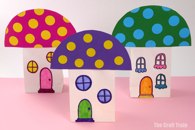 Fairy houses made from paper bags. Use these cute toadstool homes for play or place an LED tealight inside them to make a paper bag lantern #fairycraft #fairies #paperbags #toadstool #kidscrafts #fairyhouse