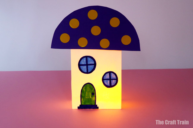 paper bag fairy house lantern. This is a fun craft kids can make for play or to use as a sweet decorative fairy lantern #fairycraft #fairies #paperbags #toadstool #kidscrafts #fairyhouse