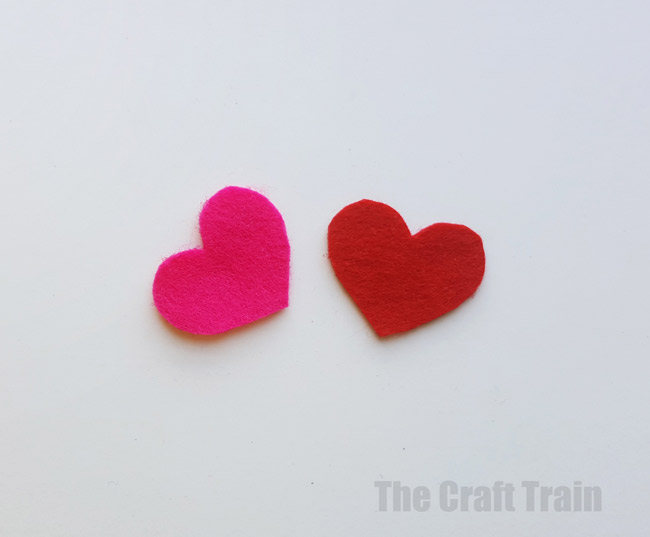 Step 5 - mini valentine matchbox craft for kids. Make the most adorable mini hand-sewn plushy heart delivered in a cute matchbox #valentine #valentinesday #matchboxcraft #kidssewing #felt #kidscraft