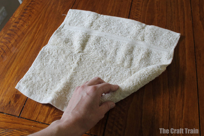 Washcloth bunny craft step 1