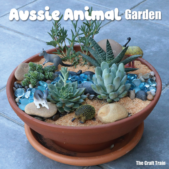 Australian animal succulent garden. This is a fun gardening project to do with kids and makes a lovely hand made gift or small world for imaginary play #succulents #succulentgarden #smallworld #gardeningwithkids #australiananimals #gardening #kidsactivities