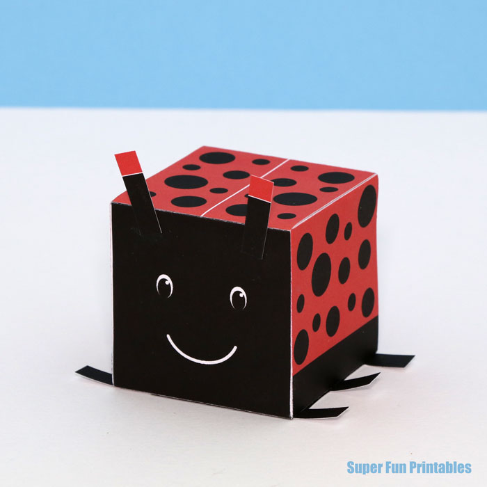 ladybug craft for kids. Make a ladybug from a 3D cube with this printable template.
