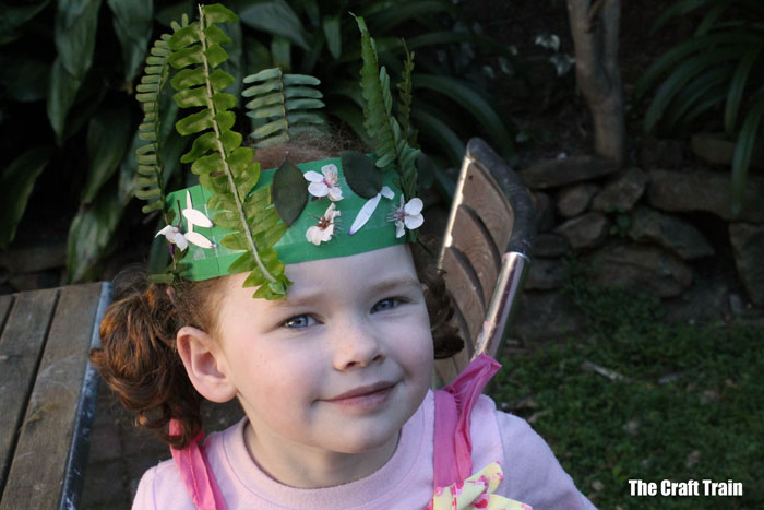 Stick flowers to paper strips with double sided tape to make sweet flower crowns