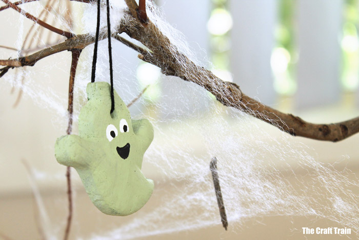Halloween salt dough ghost hanging in tree