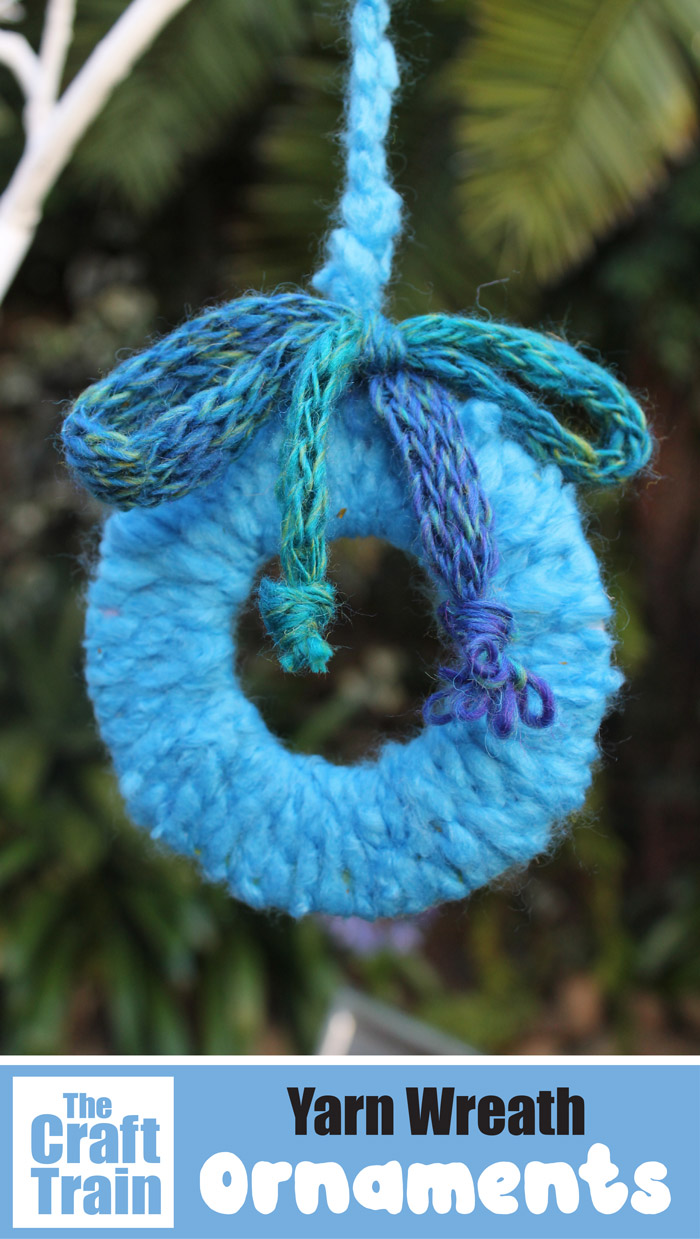 Yarn wreath ornaments kids can make from chunky yarn and cardboard scraps #yarn #kidscrafts #creativefun #christmascrafts 