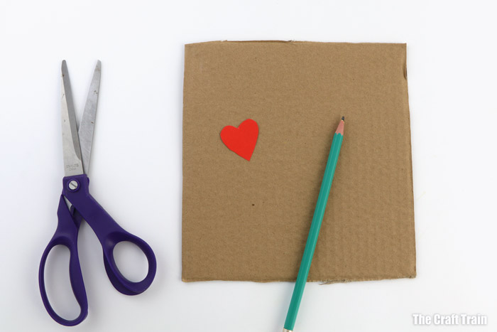 trace a heart shape onto cardboard