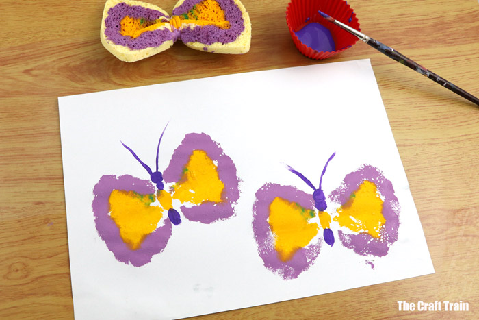 purple and yellow butterfly prints made from sponges