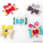 yarn butterfly craft idea for kids using a simple weaving technique