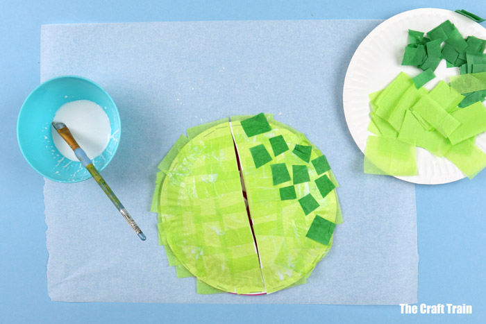 Steps to make paper plate frog puppet