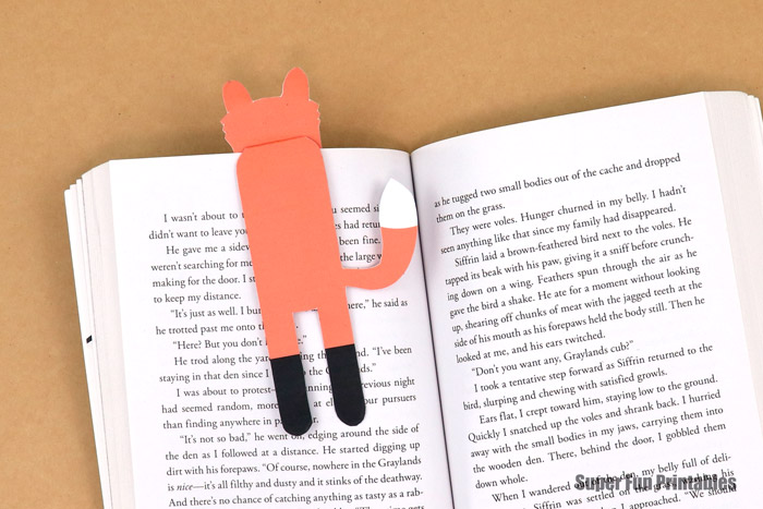 fox bookmark hanging from page