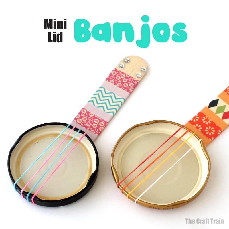 Mini lid banjos - repurpose old jar lids into a cute DIY toy. These miniature banjos are a fun stem or steam craft idea for summer!. Also a great musical instrument craft for kids #musicalinstrument #recycle #recyclingcraft #kidscraft #diytoy #jarlids #craftsticks #banjos #diy #thecrafttrain