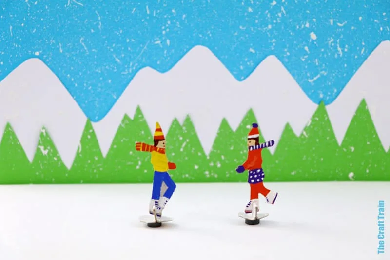 Ice skating craft for kids using recyclables. Make the cardboard children "skate" using magnets