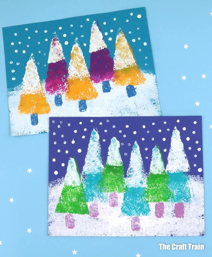 Winter landscape art made from sponge painting. This art project is so pretty and fun for kids!