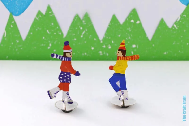 Magnetic ice skating theatre craft for kids made from a recycled cereal box