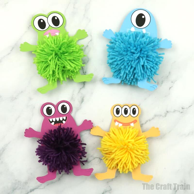 Yarn monsters made with pom poms