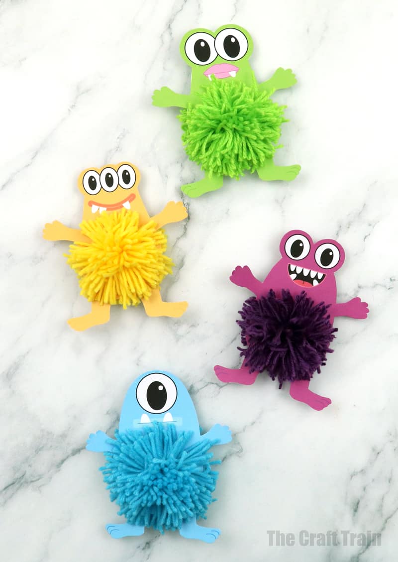 Adorable fluffy yarn monsters kids can make for Halloween