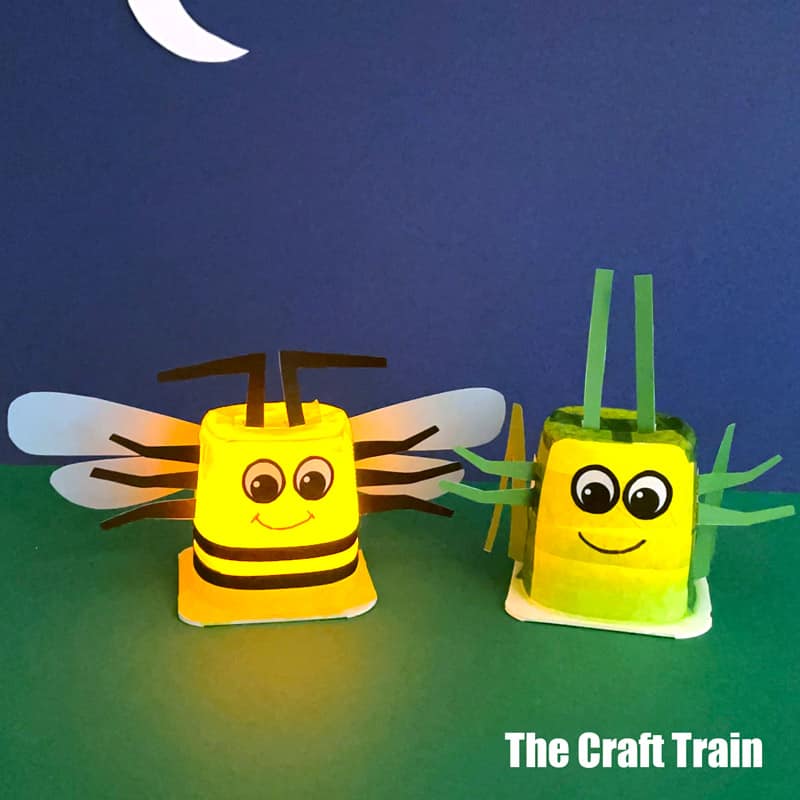 Glow bug craft for kids made from recycled yoghurt tubs with LED candles to light them up
