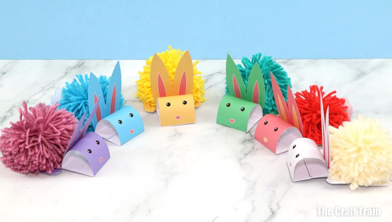 pom pom bunny craft for kids in a rainbow of colours