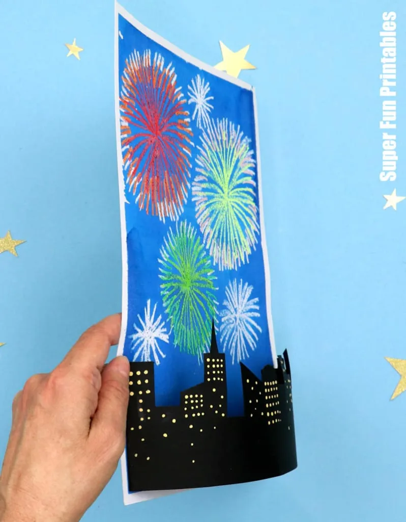 City fireworks art project with 3D effect. Such a fun New Years Eve cart project for kids!