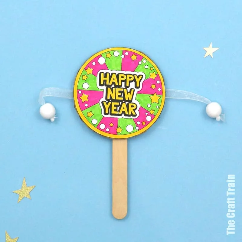 Cardboard spin drum noise maker craft for new year