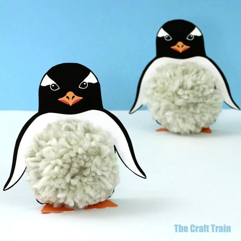Adorable pom pom penguin craft based on the Gentoo species of penguin found in Sub-Antarctic islands. Printable template available