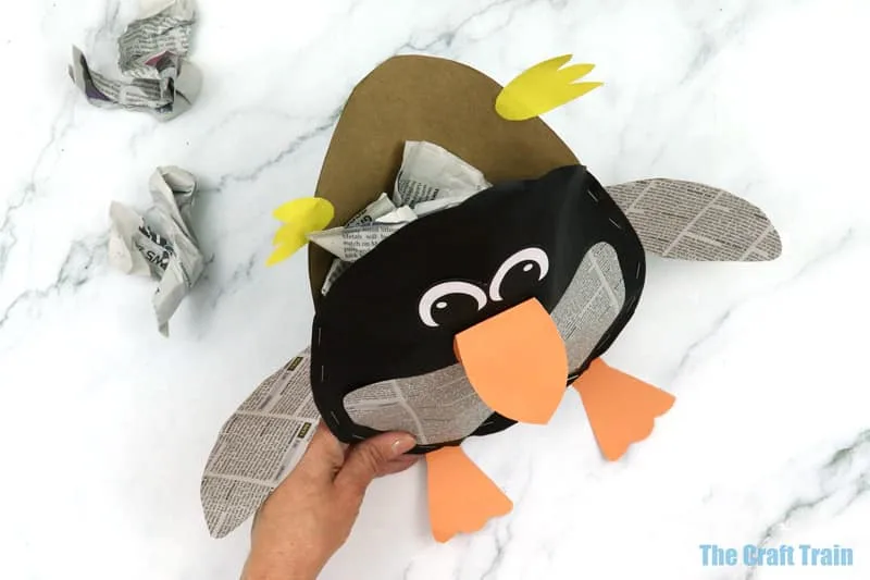 Stuffing the penguin with newspaper