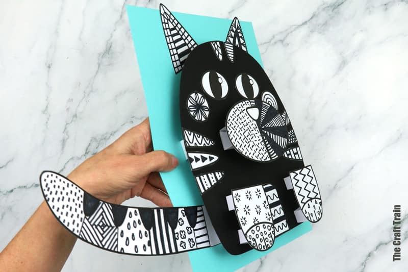 Black and white doodle cat craft with 3D effect