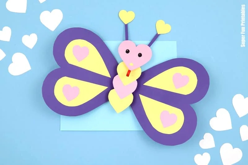 3D paper love butterfly craft for valentines Day. The butterfly is created from paper hearts